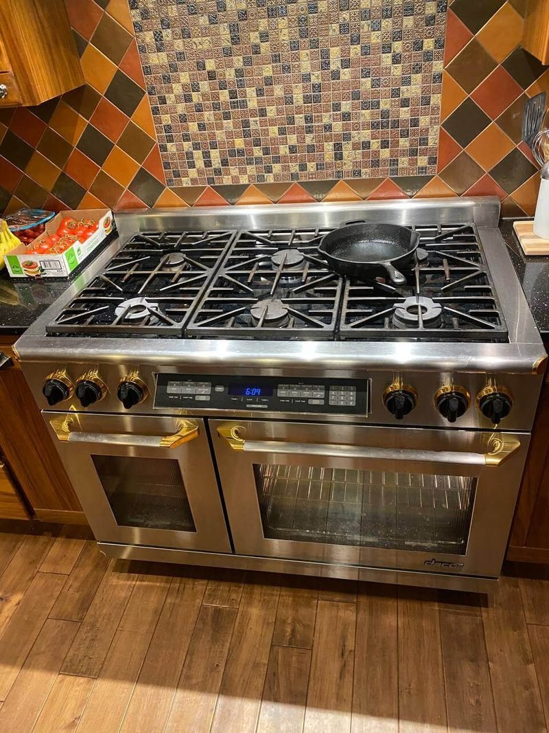 Six-burner gas range after a repair